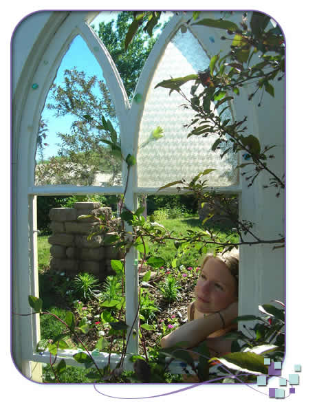 Jen posing in an old church window - MN Landscape Arboretum Arboretum Exhibit Picture